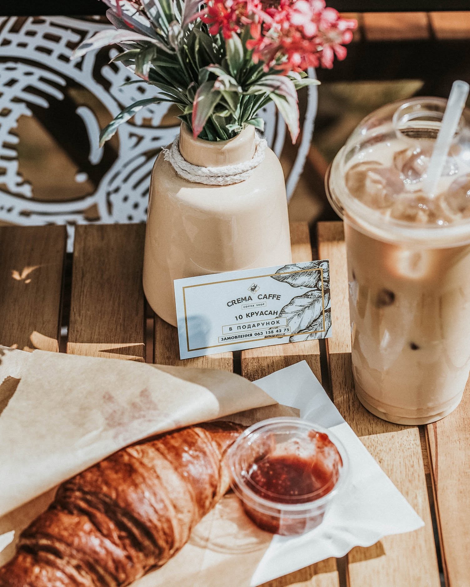 Coffee and a croissant at Crema Caffe